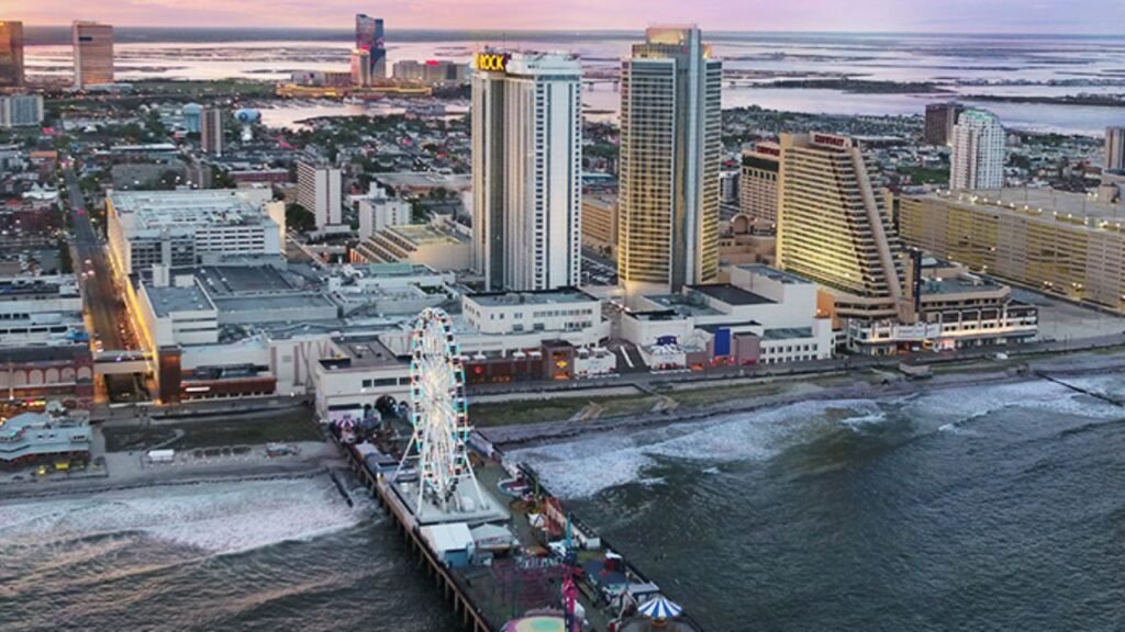Atlantic City, NJ cityscape with boardwalk, high-rise hotels, and residential properties in Atlantic County